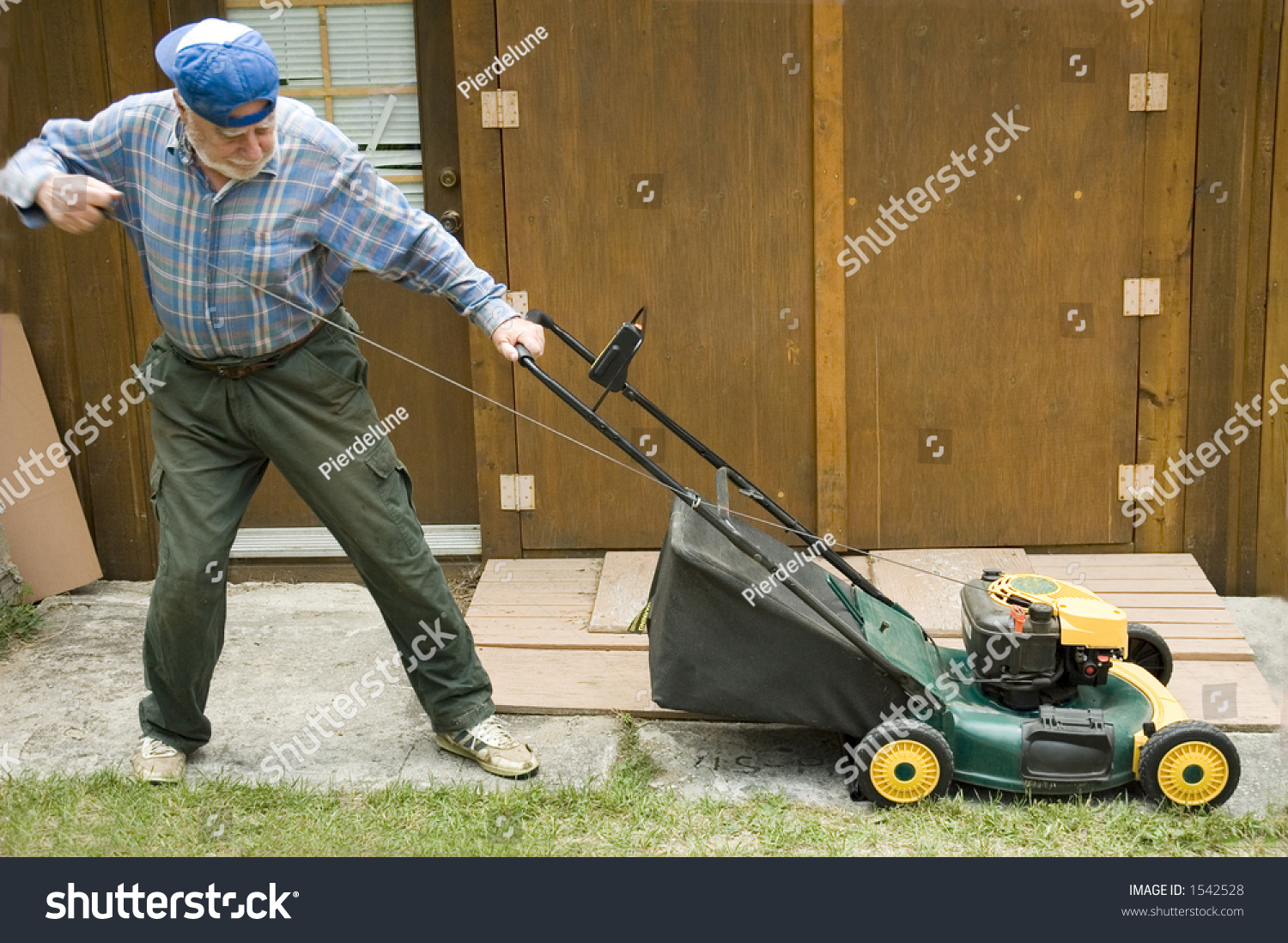 shutterstock image of an old man attempting to start a lawn mower